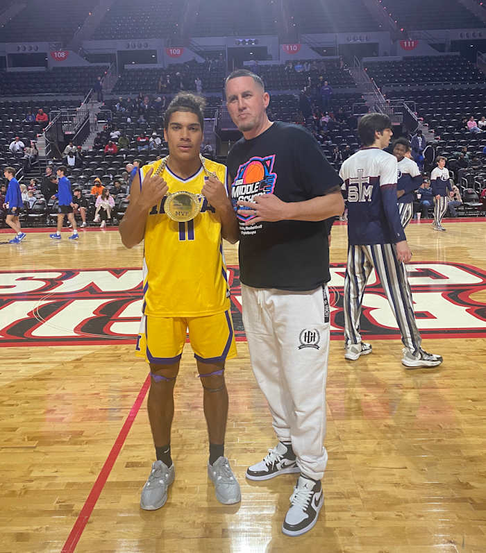Iowa's Cohen Charles (left) poses with Brad Boyd, the organizer of the Cajundome Classic, on January 20, 2024. Charles was named the MVP of the Yellow Jackets' win against Lafayette Christian.